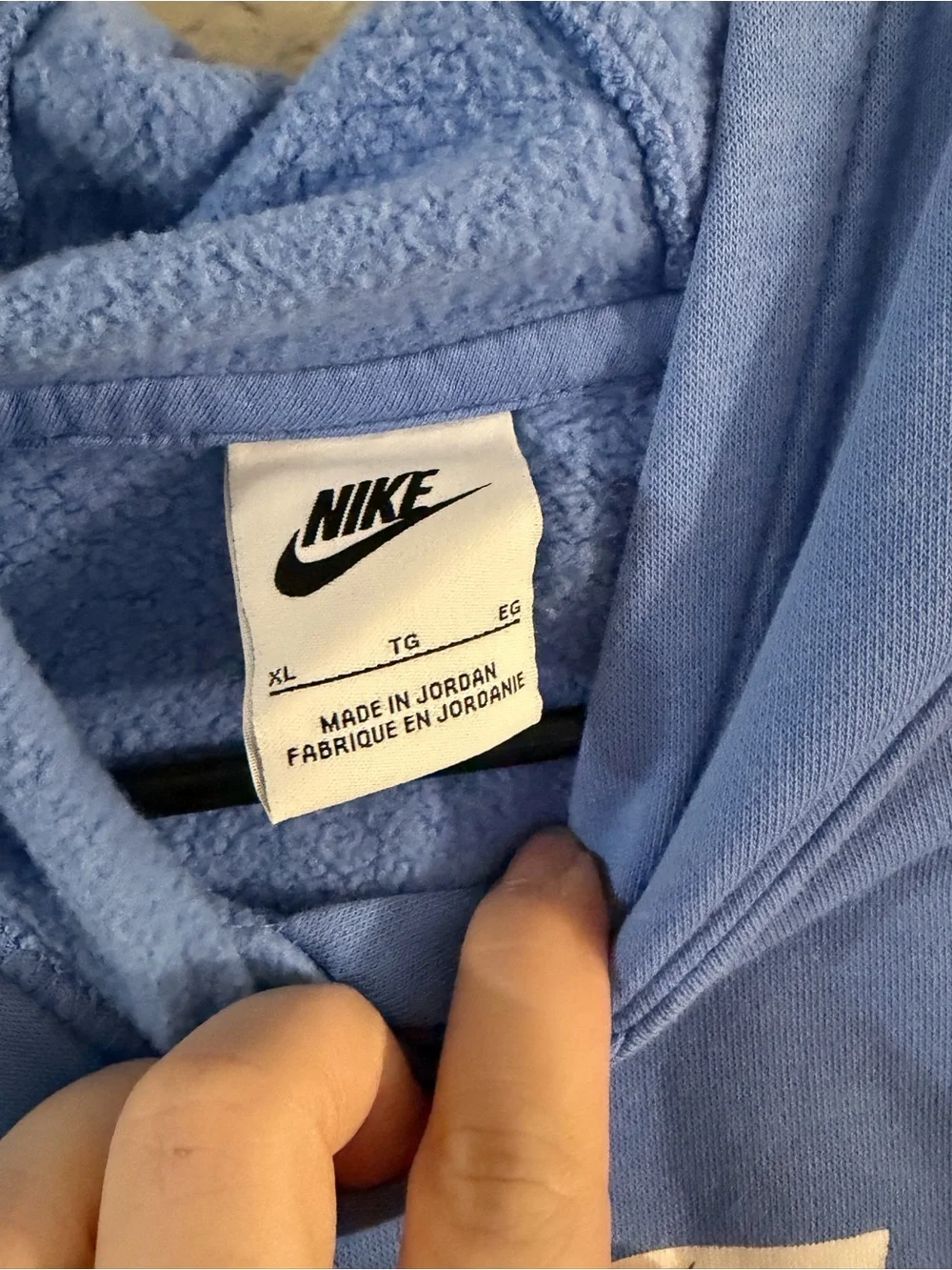 Nike Light Blue Hoodie with White Swoosh